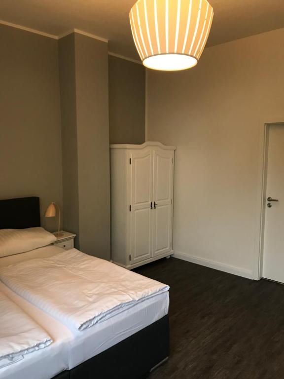 Postel nebo postele na pokoji v ubytování Hotel Fame am Hauptbahnhof