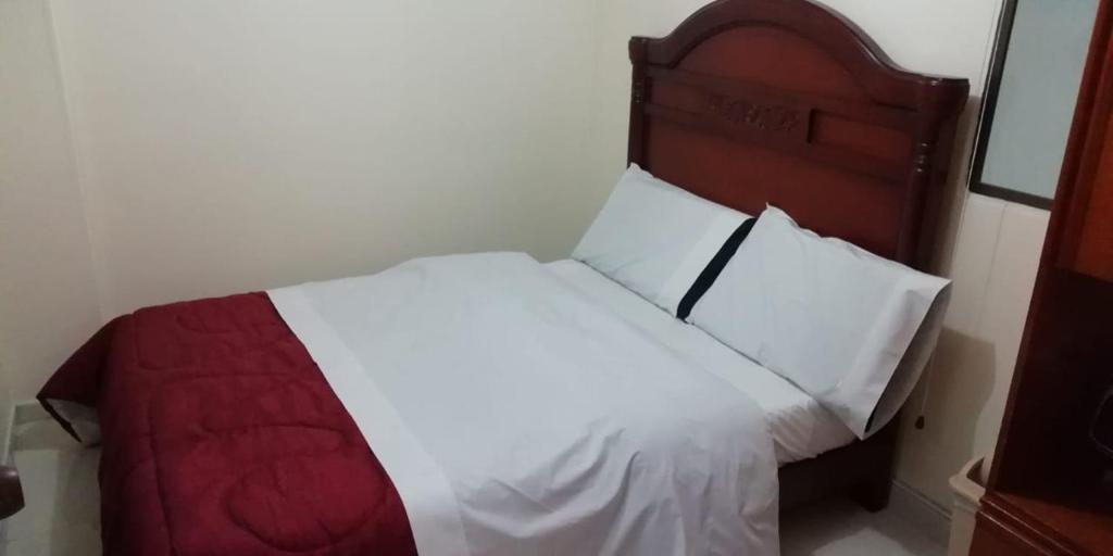 Postel nebo postele na pokoji v ubytování Hostal Fontanar Prado