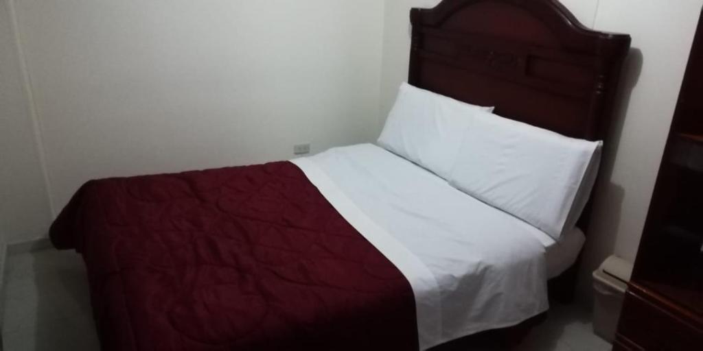 Postel nebo postele na pokoji v ubytování Hostal Fontanar Prado