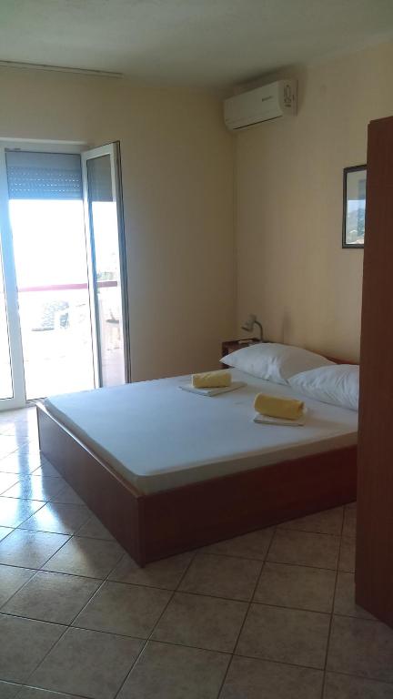 Posteľ alebo postele v izbe v ubytovaní Guesthouse BILI