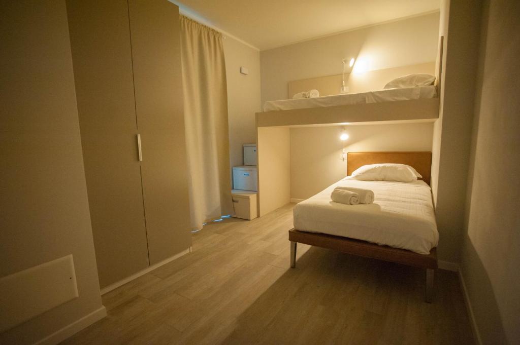 Posteľ alebo postele v izbe v ubytovaní Italianflat - Maison du Lac