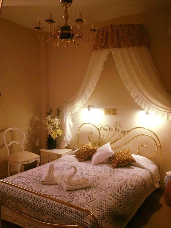 Postel nebo postele na pokoji v ubytování Saint George Hotel