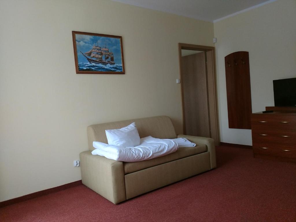 Łóżko lub łóżka w pokoju w obiekcie Villa Sylvia