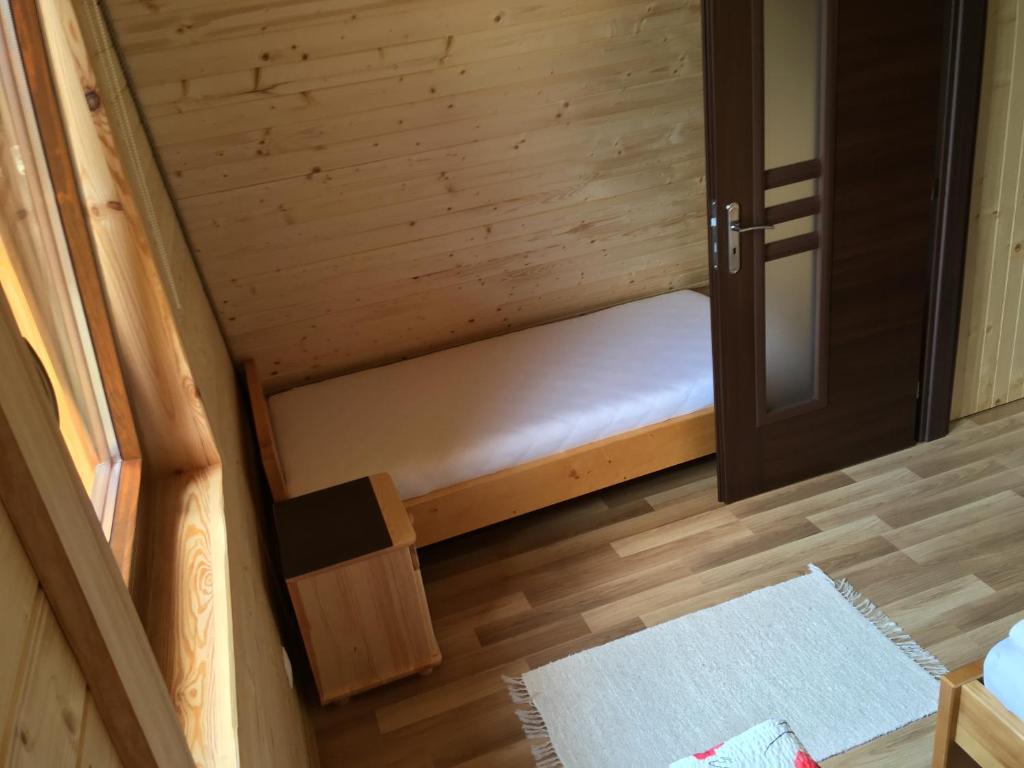 Postel nebo postele na pokoji v ubytování Cottage Family