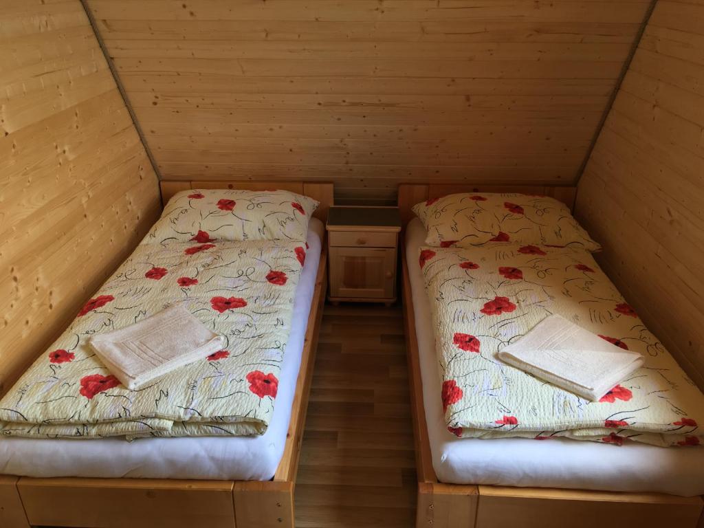 Postel nebo postele na pokoji v ubytování Cottage Family