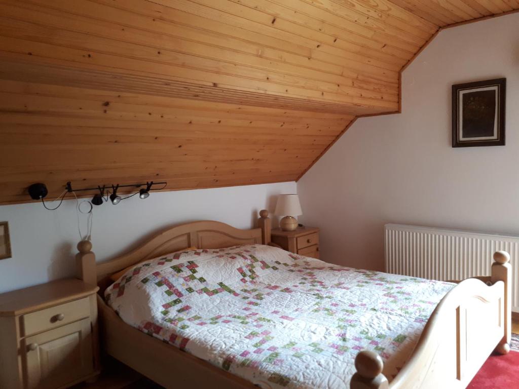 Postel nebo postele na pokoji v ubytování Holiday House Jasna