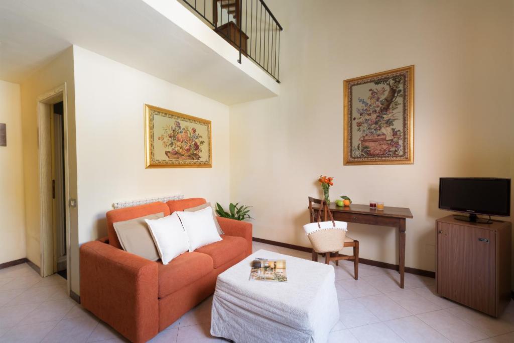TV a/nebo společenská místnost v ubytování Hotel Dei Capitani
