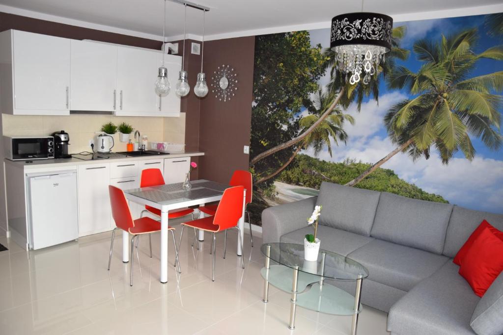 Kuchyňa alebo kuchynka v ubytovaní Apartament Ibiza przy plaży