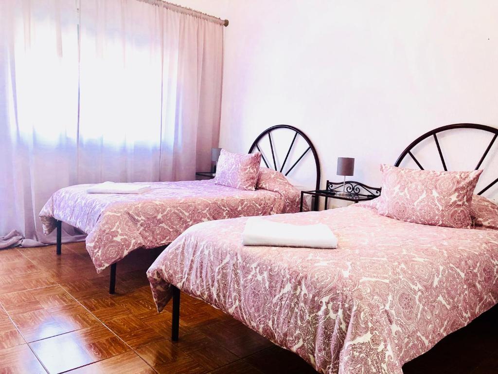 Ένα ή περισσότερα κρεβάτια σε δωμάτιο στο Suites Do Pinhal