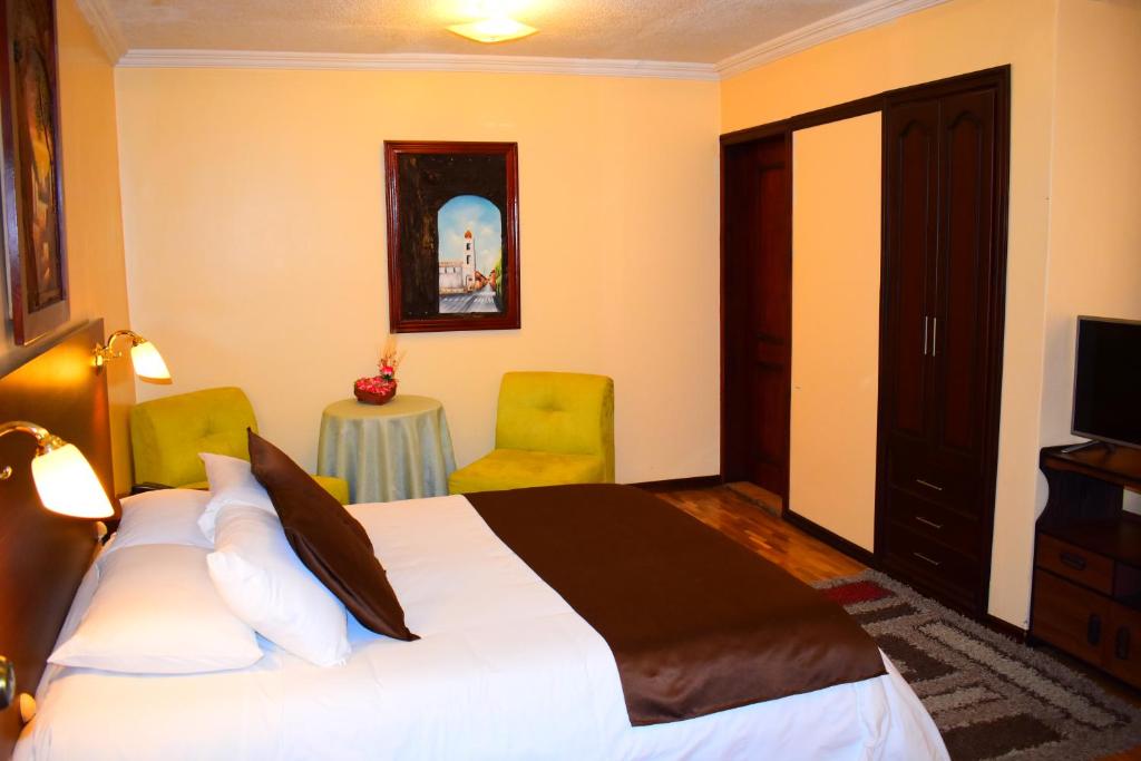 Postel nebo postele na pokoji v ubytování Endamo Hotel