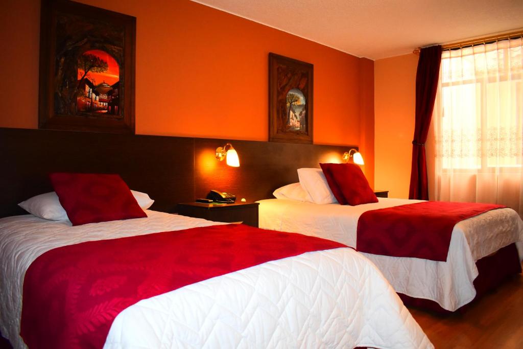 Postel nebo postele na pokoji v ubytování Endamo Hotel