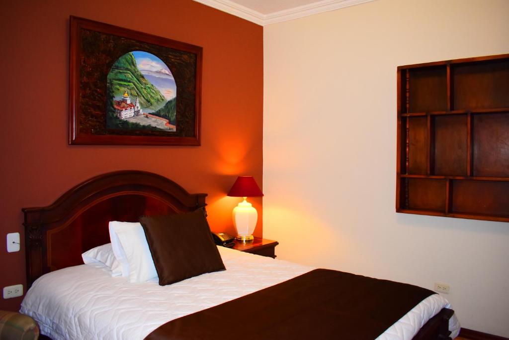 Postel nebo postele na pokoji v ubytování Endamo Hotel
