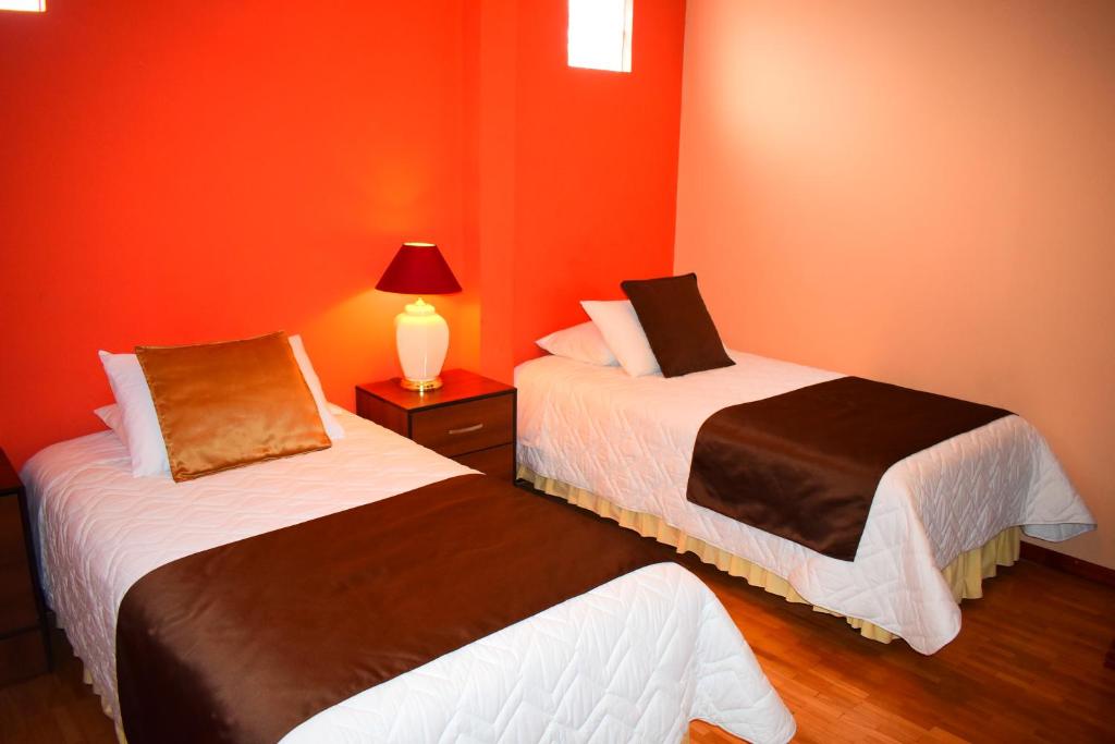 Postel nebo postele na pokoji v ubytování Endamo Hotel