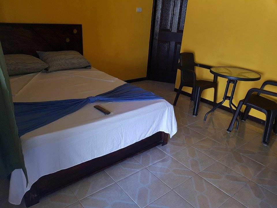 Postel nebo postele na pokoji v ubytování Cabinas Hukats Secret Jungle