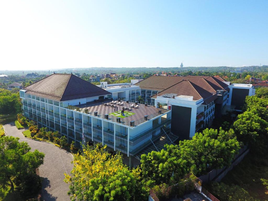 an overhead view of a building with a roof at The Sintesa Residence Jimbaran in Jimbaran