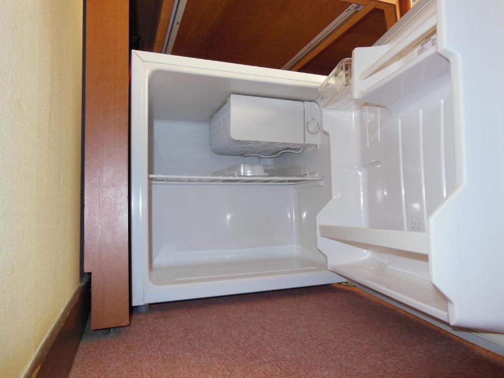 Kuchyň nebo kuchyňský kout v ubytování Smile Hotel Kakegawa