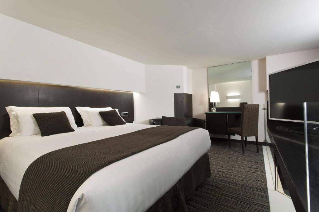 Postel nebo postele na pokoji v ubytování Best Western Plus Hotel Universo