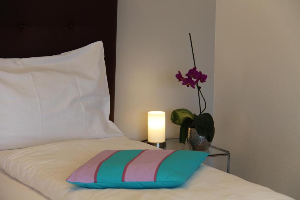 Postel nebo postele na pokoji v ubytování Seerausch Swiss Quality Hotel