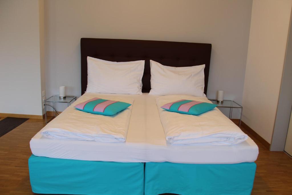 Postel nebo postele na pokoji v ubytování Seerausch Swiss Quality Hotel