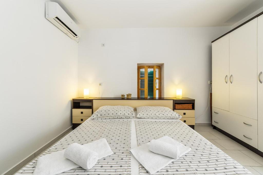 Postel nebo postele na pokoji v ubytování Holiday Home Ljubica
