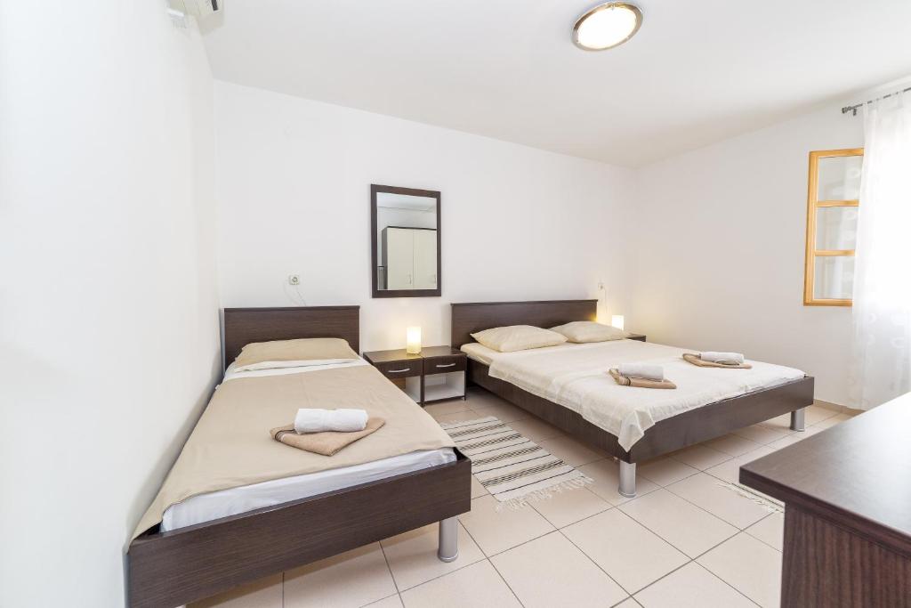 Postel nebo postele na pokoji v ubytování Holiday Home Ljubica