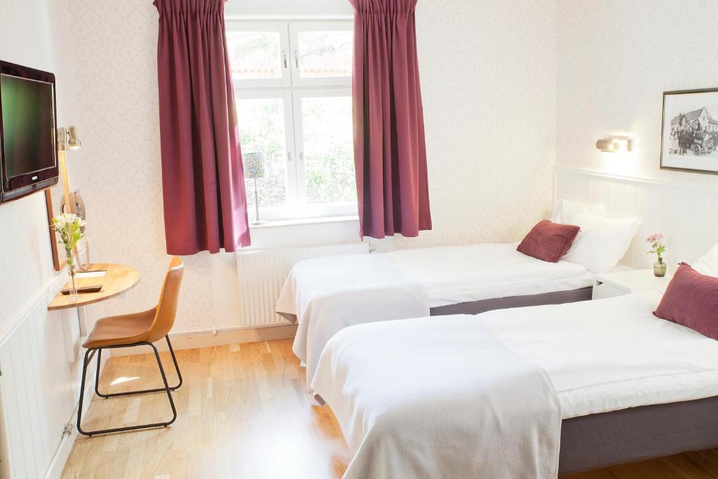 Postel nebo postele na pokoji v ubytování STF Hotel Zinkensdamm
