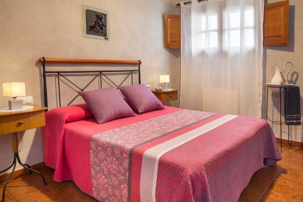 Posteľ alebo postele v izbe v ubytovaní Turisme Rural Ca l,Anguila