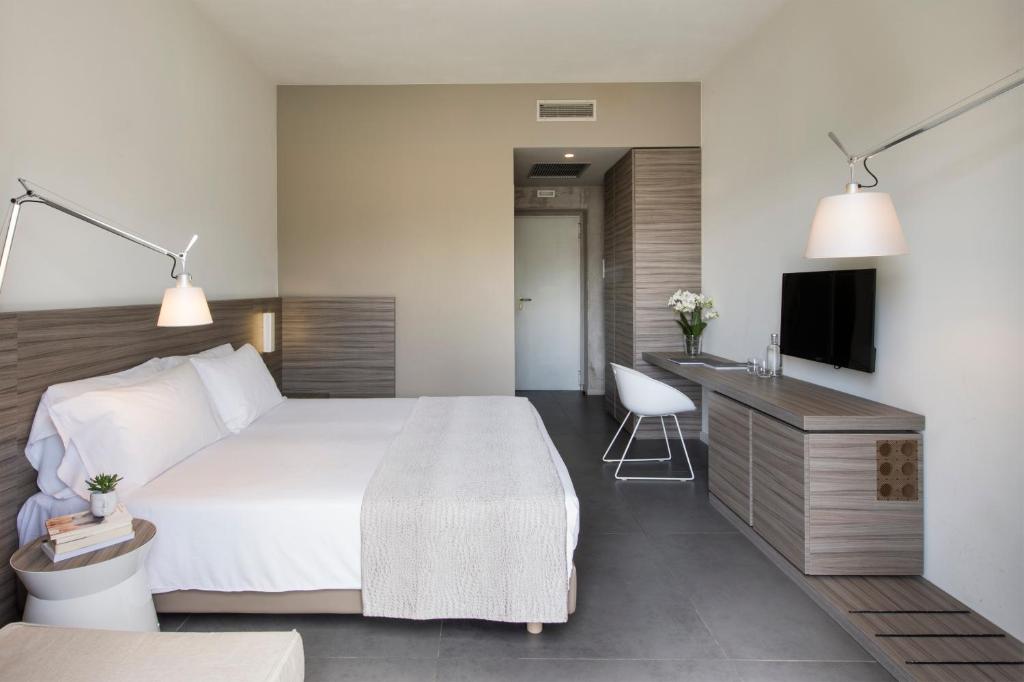 Postel nebo postele na pokoji v ubytování Hotel & Resort Le Colombare