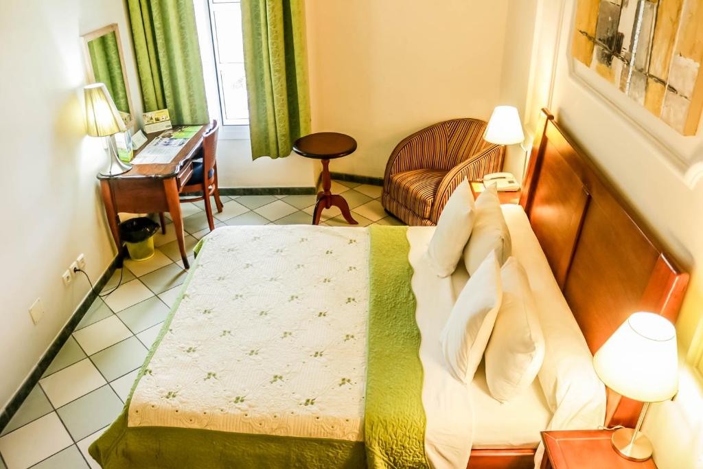 Postel nebo postele na pokoji v ubytování Tchero Hotel