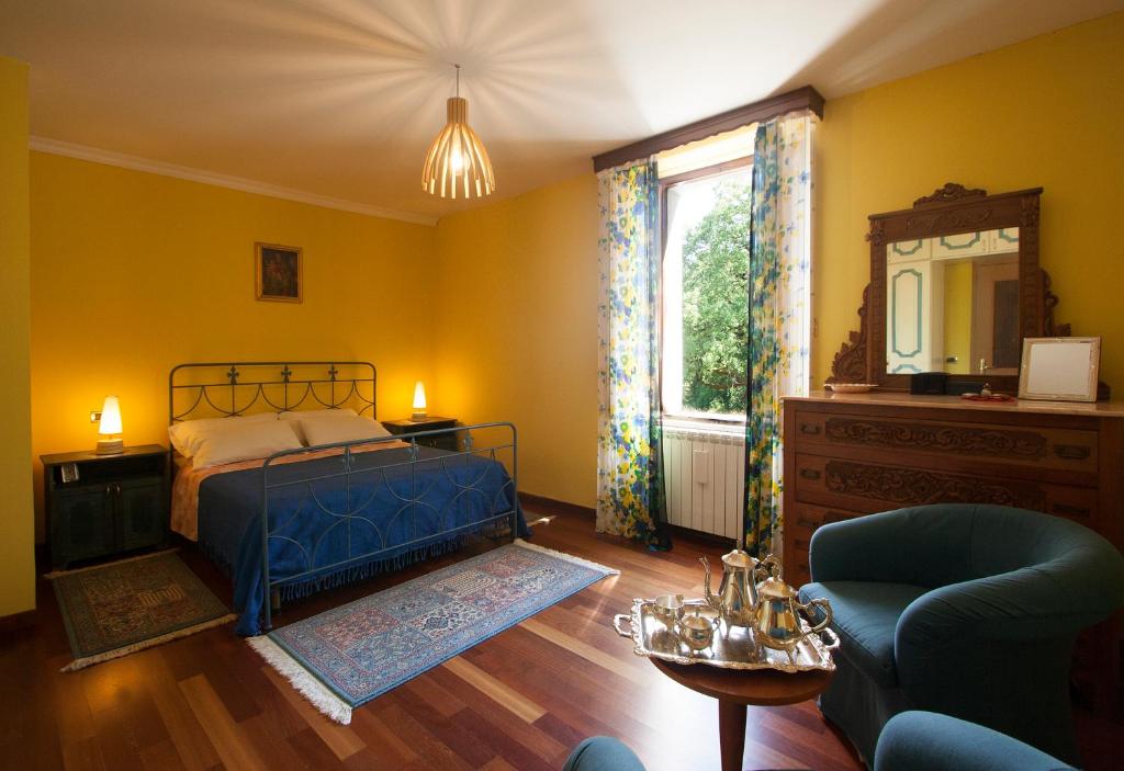 Postel nebo postele na pokoji v ubytování Casa nel verde