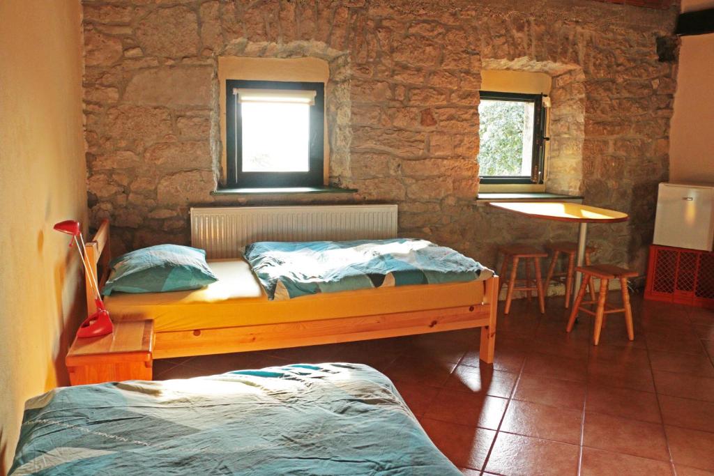 Postel nebo postele na pokoji v ubytování Stonehouse