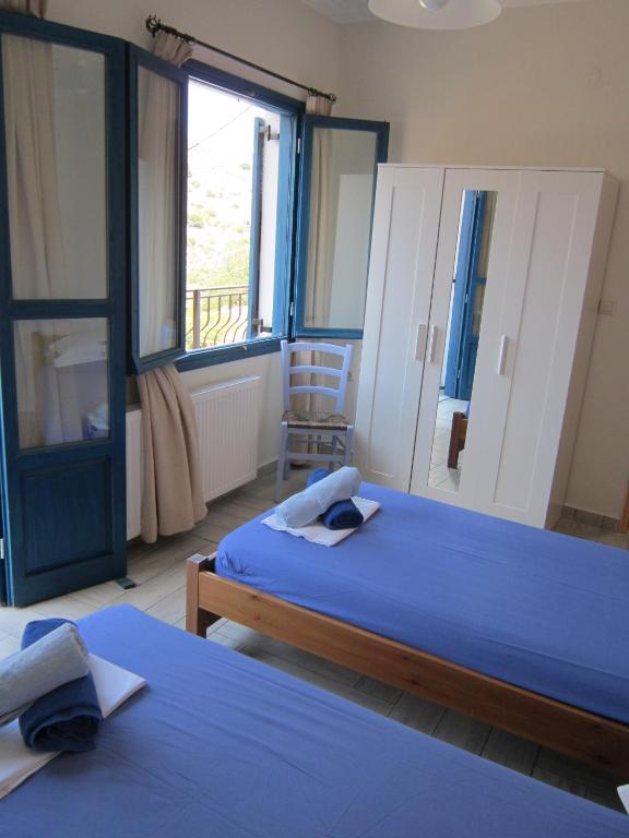 Postel nebo postele na pokoji v ubytování Fig Leaf House