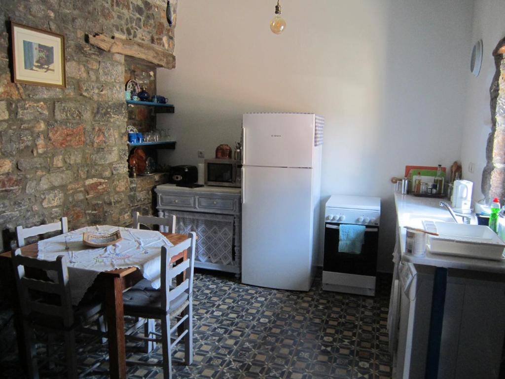 Kuchyň nebo kuchyňský kout v ubytování Fig Leaf House