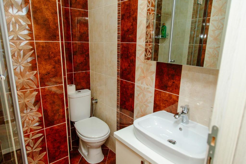 Koupelna v ubytování Apartmani Mozaici