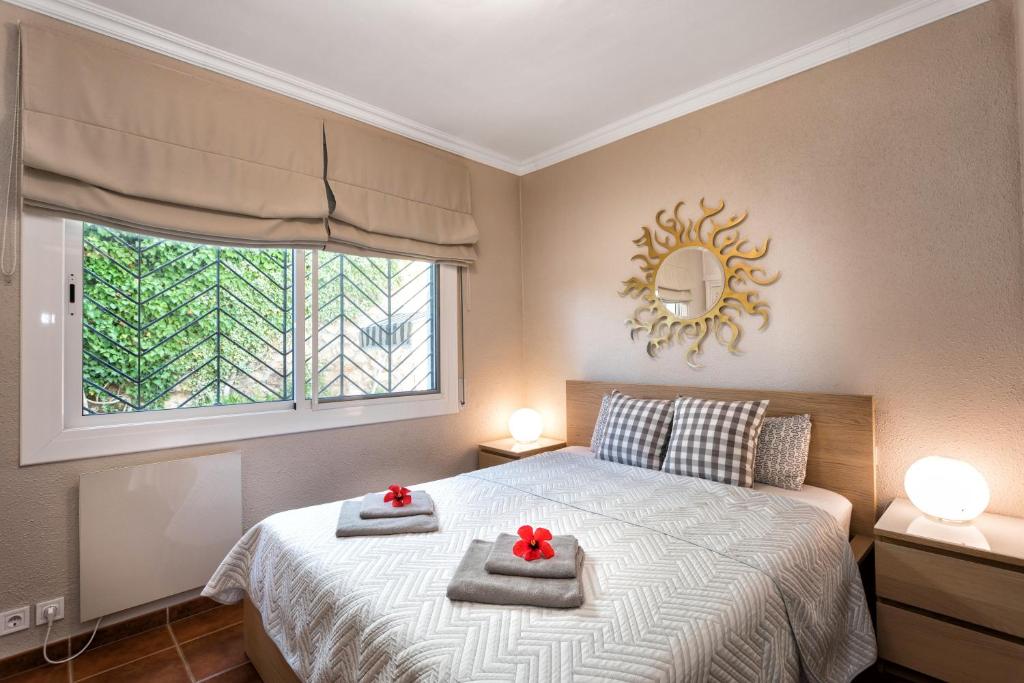 Posteľ alebo postele v izbe v ubytovaní Costa Maresme Apartment