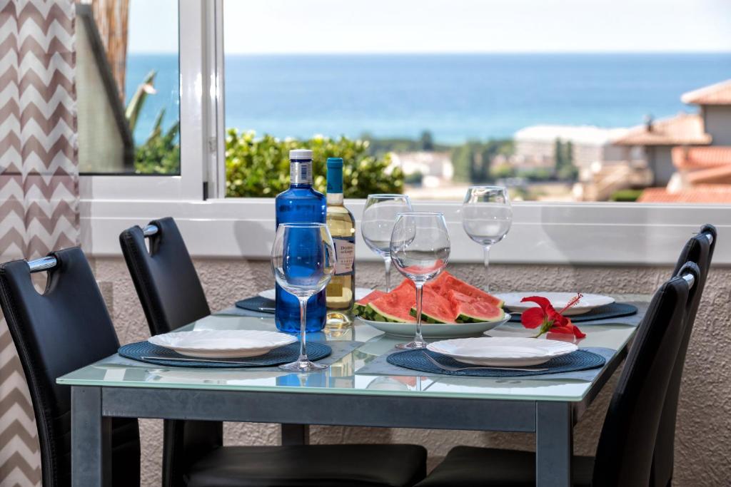 Nápoje v ubytovaní Costa Maresme Apartment