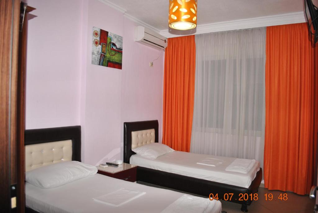 Llit o llits en una habitació de Hotel Freskia