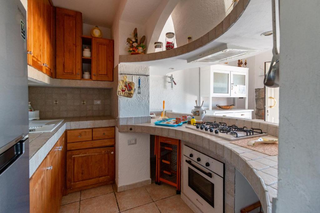 A kitchen or kitchenette at Casale Gli Ulivi