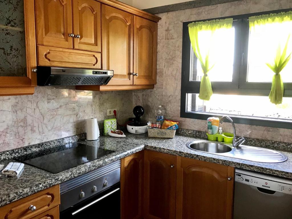 A kitchen or kitchenette at Villa Mici
