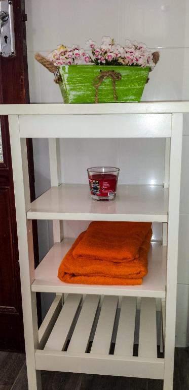 Palanda nebo palandy na pokoji v ubytování Casa PALMAROSA