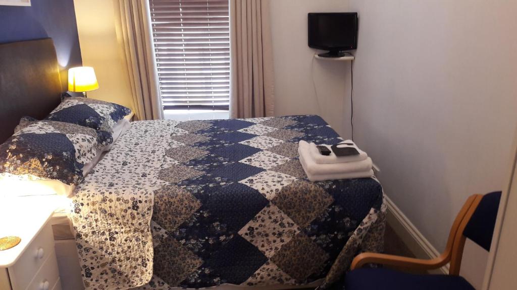 Ένα ή περισσότερα κρεβάτια σε δωμάτιο στο Bed And Blueberry