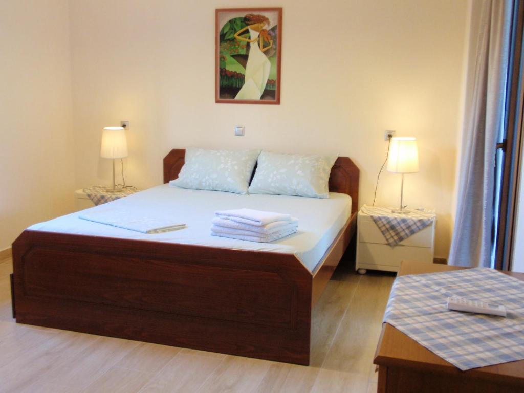 Postel nebo postele na pokoji v ubytování Hotel Nestor