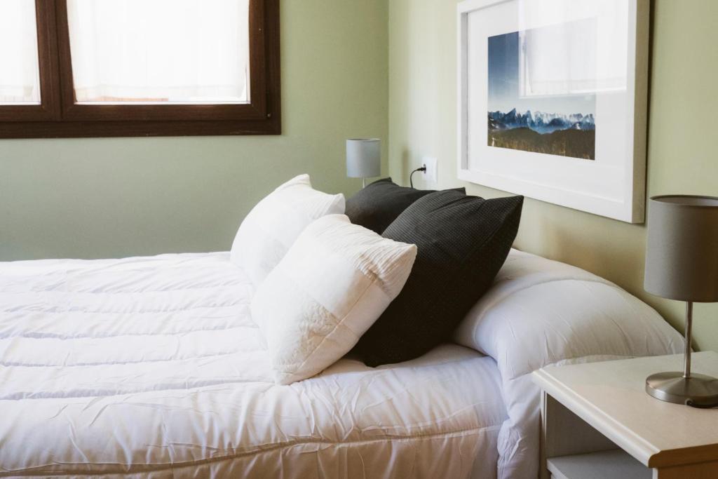 Een bed of bedden in een kamer bij Apartamento Garona