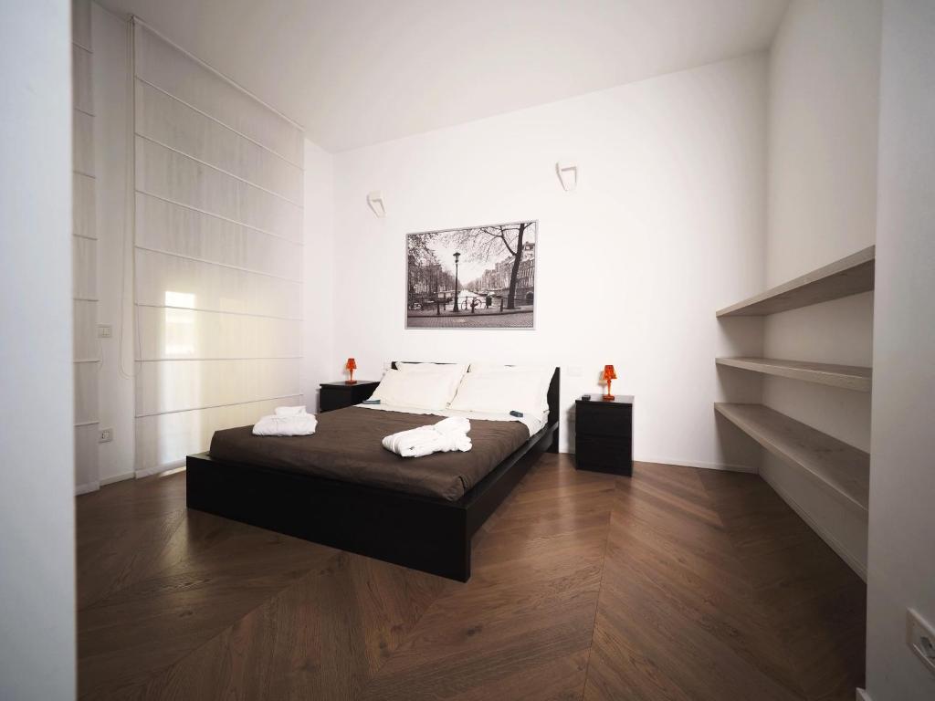 Postel nebo postele na pokoji v ubytování Turati 3