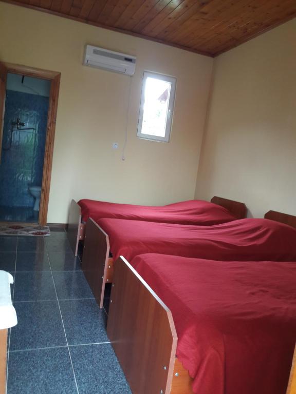 Postel nebo postele na pokoji v ubytování Guest house LIA