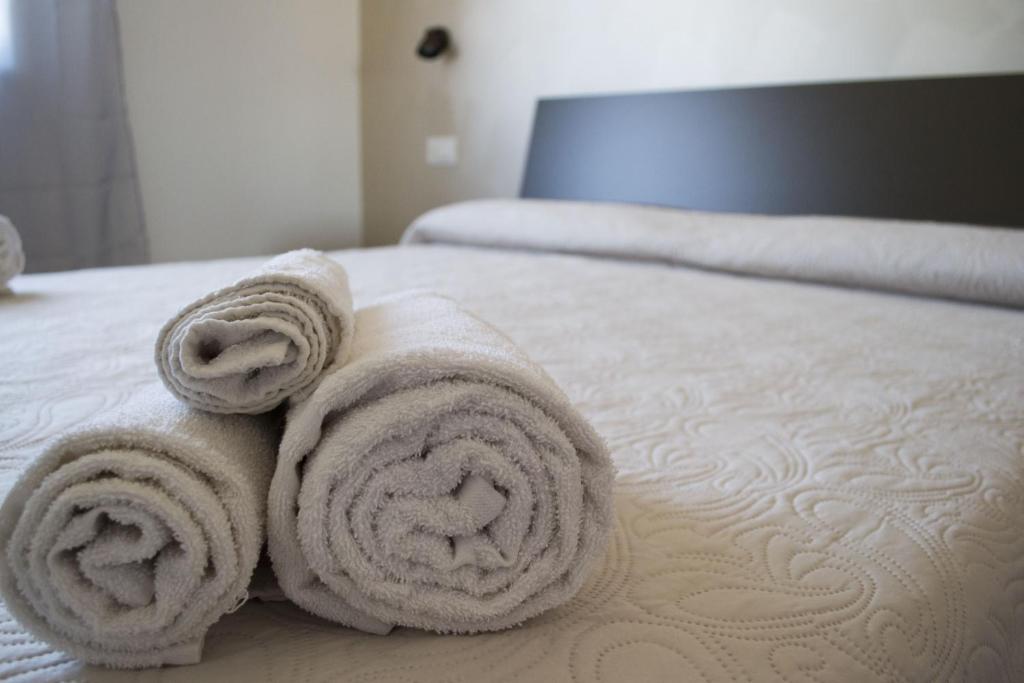 Łóżko lub łóżka w pokoju w obiekcie Four Winds B&B