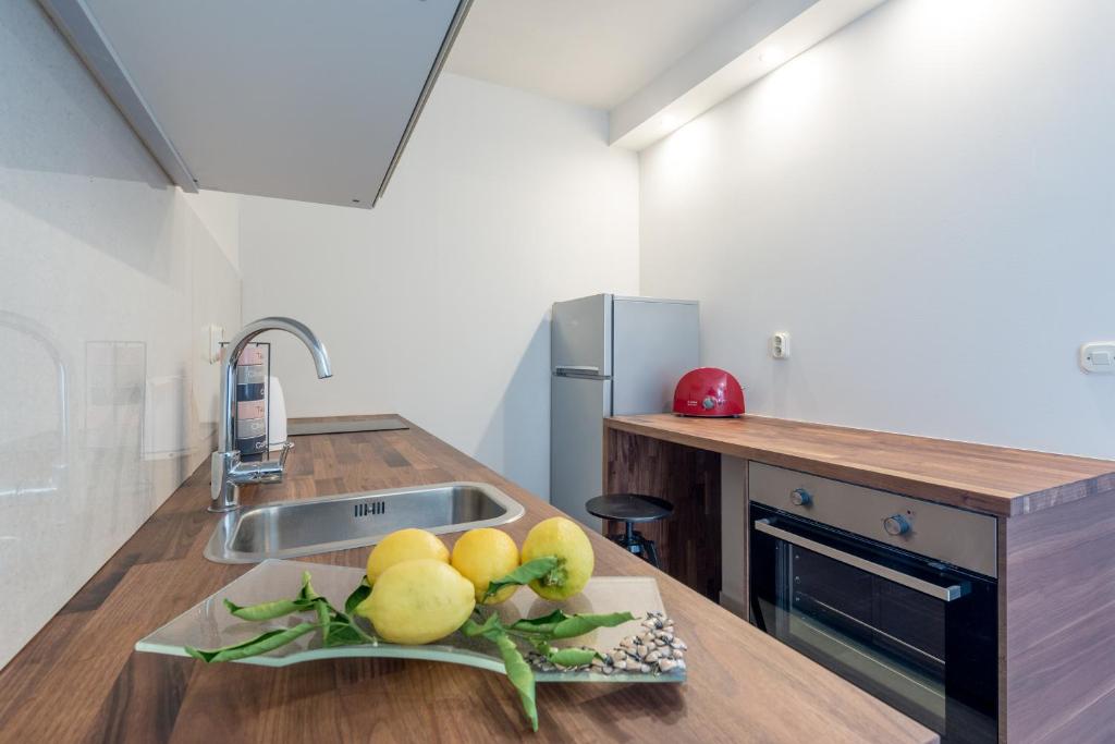Kuchyňa alebo kuchynka v ubytovaní Apartment Pasara