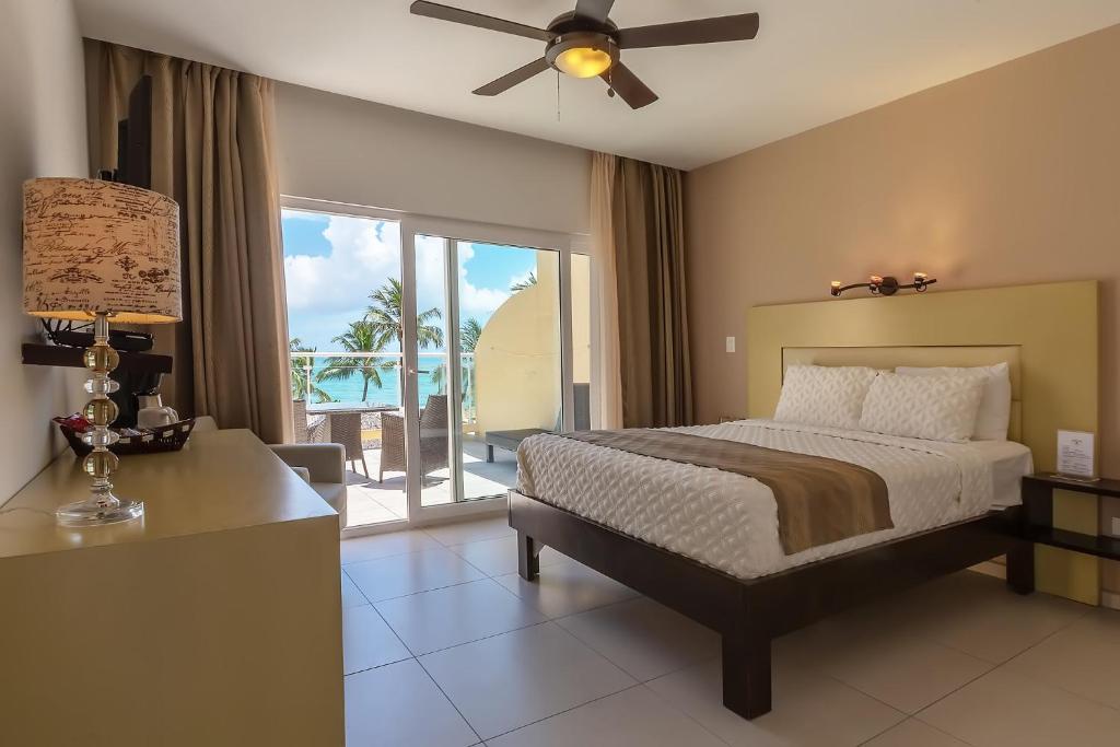 Postel nebo postele na pokoji v ubytování Hotel Villa Taina