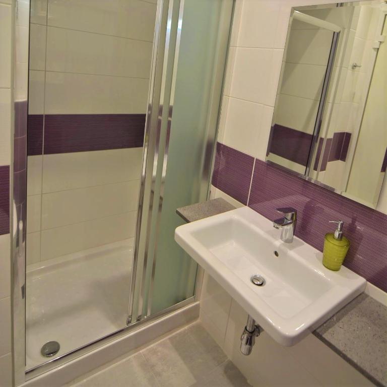 Koupelna v ubytování Hotel Nestor