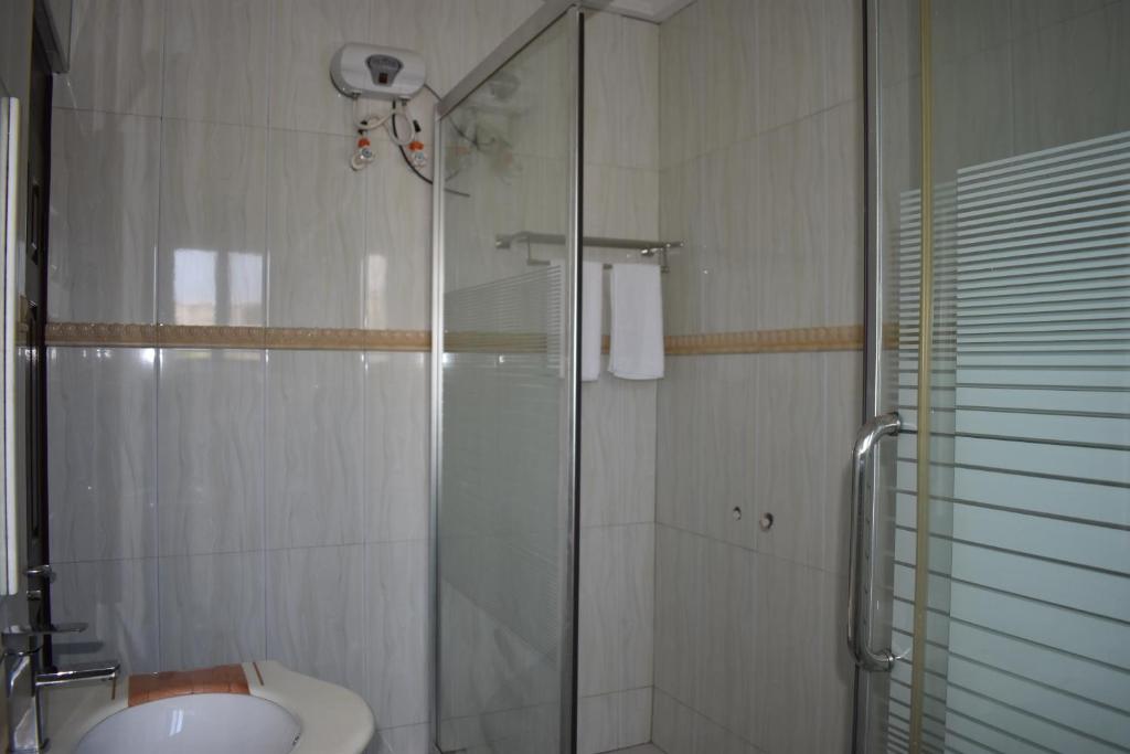 Koupelna v ubytování Cascade Hotel